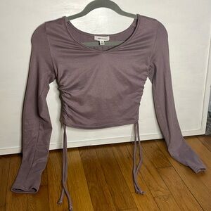 like new, adjustable strings on sides.